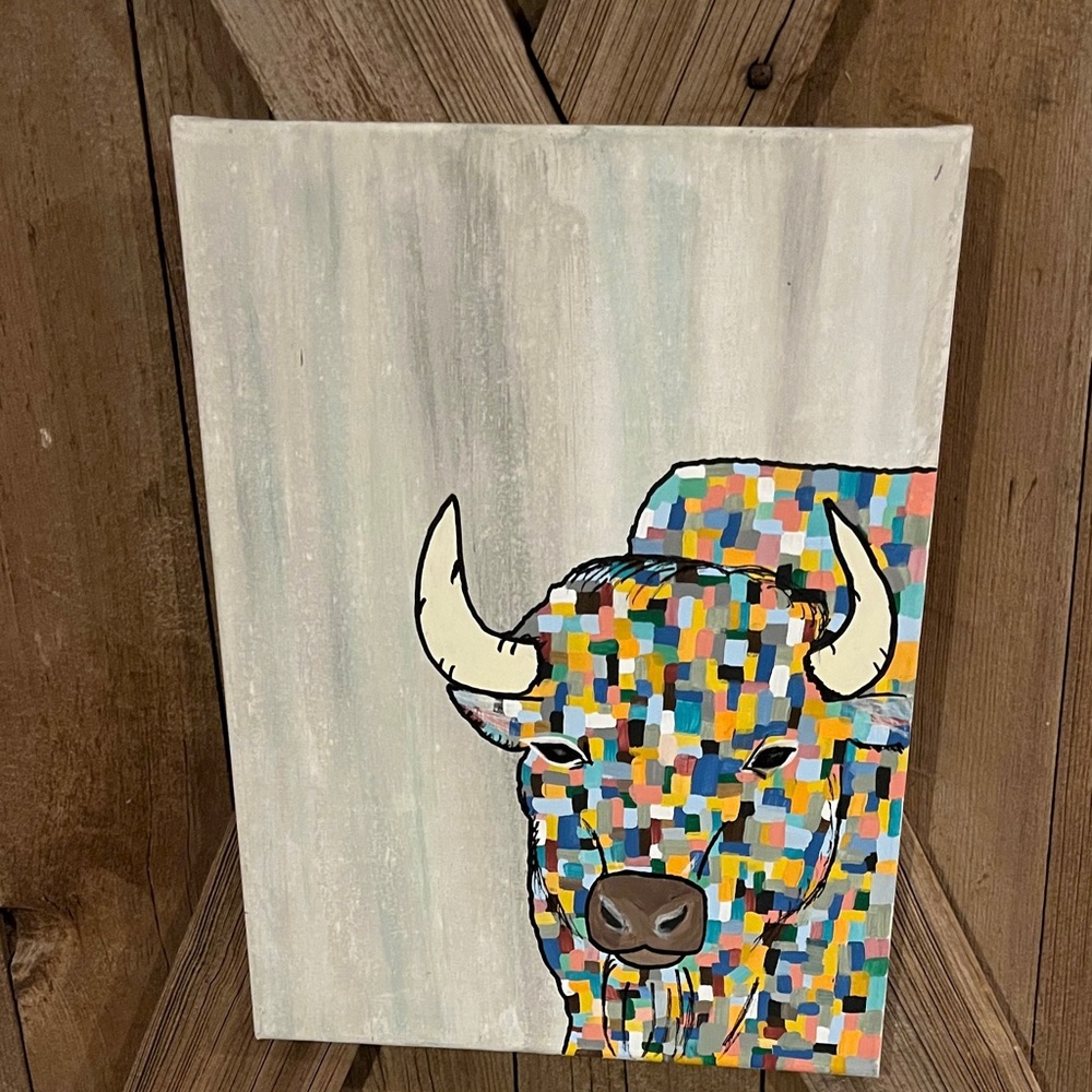 Buffalo of many colors on canvas